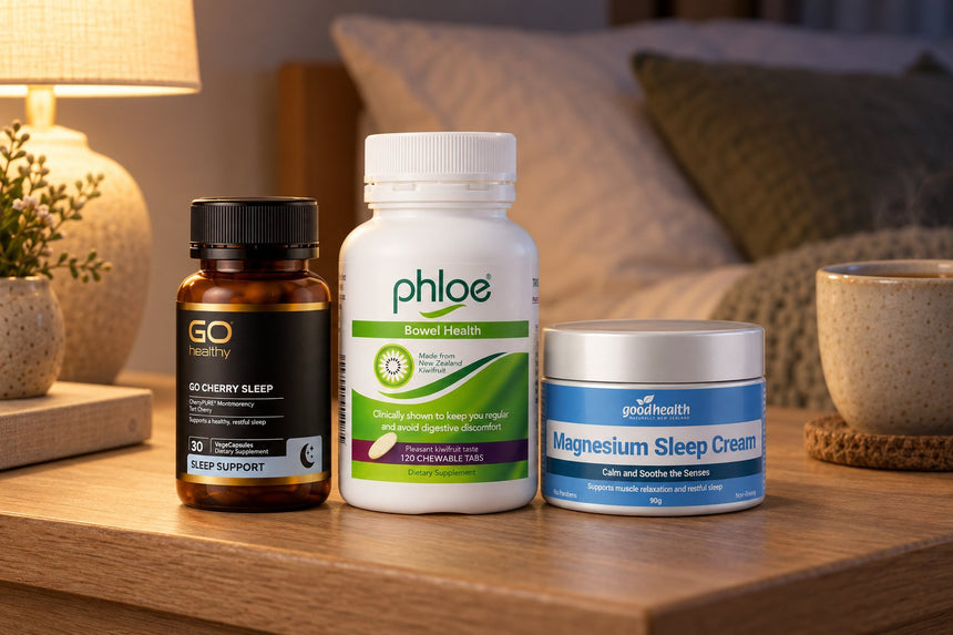 Phloe Chewables, GO Cherry Sleep and Good Health Magnesium Sleep Cream on a bedside table in evening lamplight